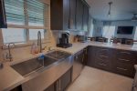 Convenient amenities combined with tasteful design make the kitchen the favorite place to be